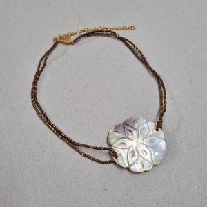 JEWELED BLOOM CHOKER IN GOLD FINISH, HANDMADE WITH GLASS BEADS AND CARVED MOTHER OF PEARL