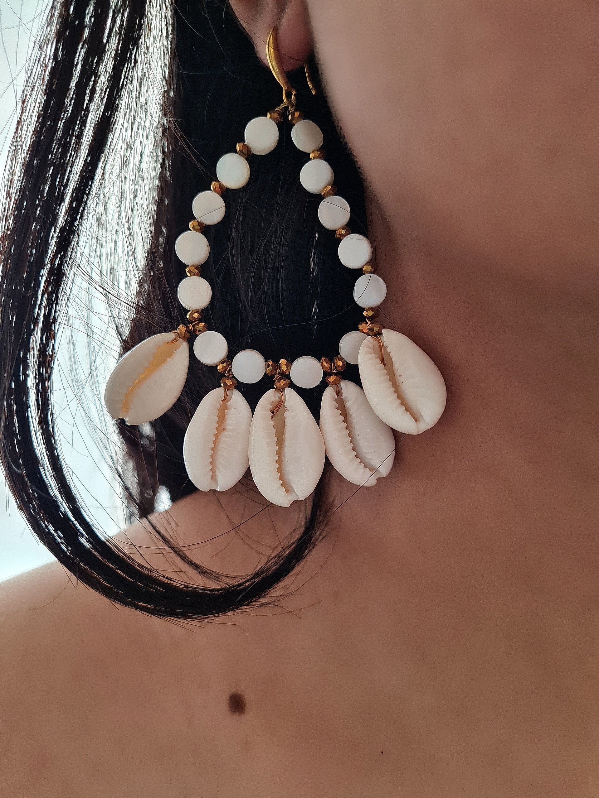 COWRIE SHELL STATEMENT DROP EARRINGS IN GOLD FINISH