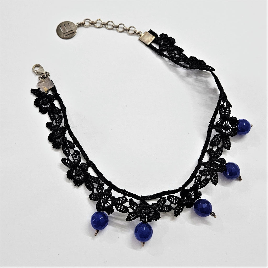 Black lace choker with floral detailing  with blue semi precious onyx beads hanging down with 925 silver fastenings