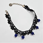 Black lace choker with floral detailing  with blue semi precious onyx beads hanging down with 925 silver fastenings