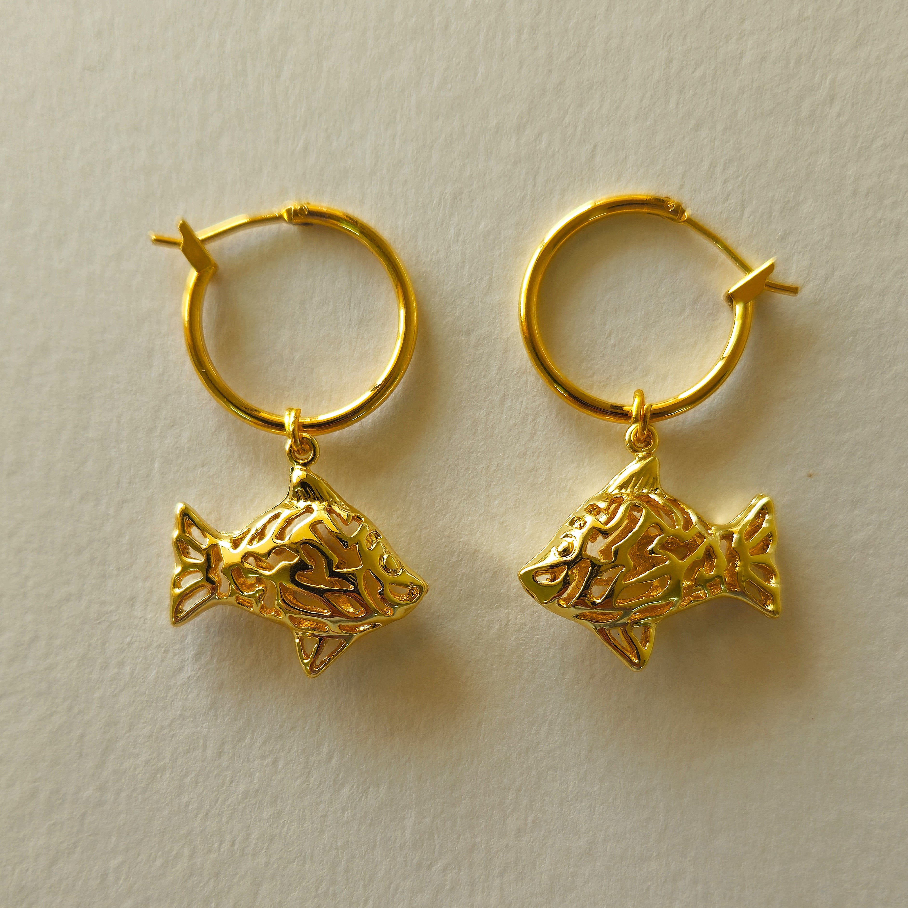 FISH HOOPS SCULPTED IN BRASS