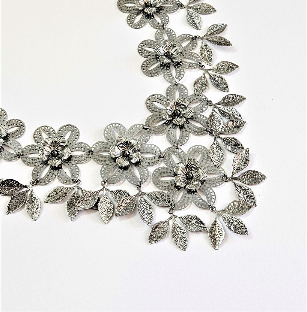 3d sculpted flower necklace with brass carved leaves