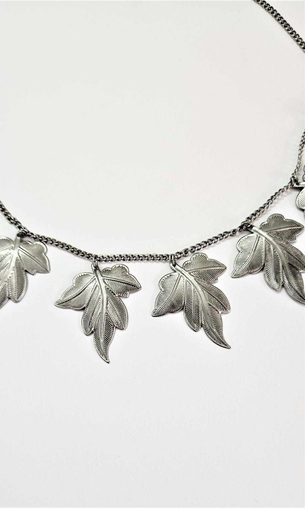 The maple allure necklace by skedio,necklace with sculpted leaves