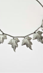 The maple allure necklace by skedio,necklace with sculpted leaves