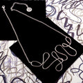 DOODLE ART STATEMENT NECKPIECE IN SILVER