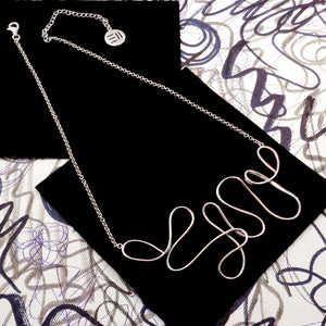 DOODLE ART STATEMENT NECKPIECE IN SILVER